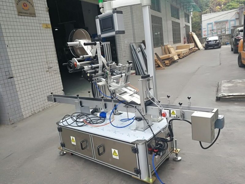 चीन स्टीकर शीर्ष लेबलिंग मशीन नोजल पाउच इलेक्ट्रिक संचालित प्रकार के लिए आपूर्तिकर्ता